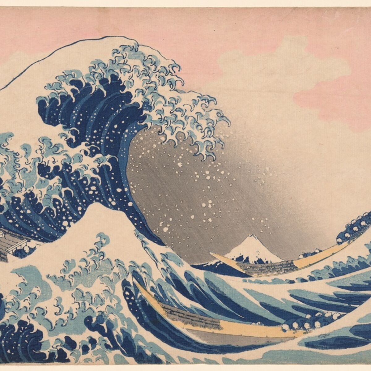 Japanese woodblock print of a huge curling wave about to crash over fishing boats, with Mount Fuji small in the distance.